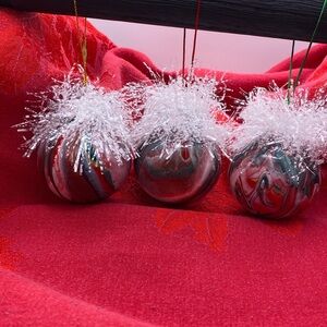 Acrylic poured ornaments with embellished fringe on top. ￼